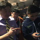 From left to right: James Chen, Justin Wong, and Du “NuckleDu” Dang check out Ultra Street Fighter II on the Nintendo Switch